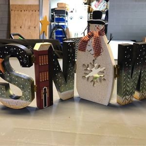 Snow wooden Xmas decor with candle